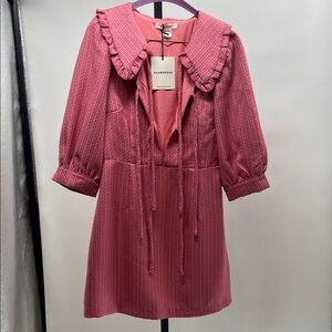 Glamorous Textured Pink Dress with Ruffled Collar